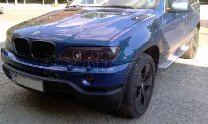 Φανάρια εμπρός angel eyes για BMW X5 (1999-2003) - black , με λάμπες (Η1) - σετ 2τμχ. 